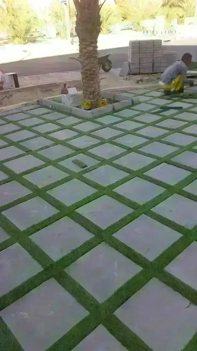 تنسيق الحدائق وتركيب التيل الصناعى